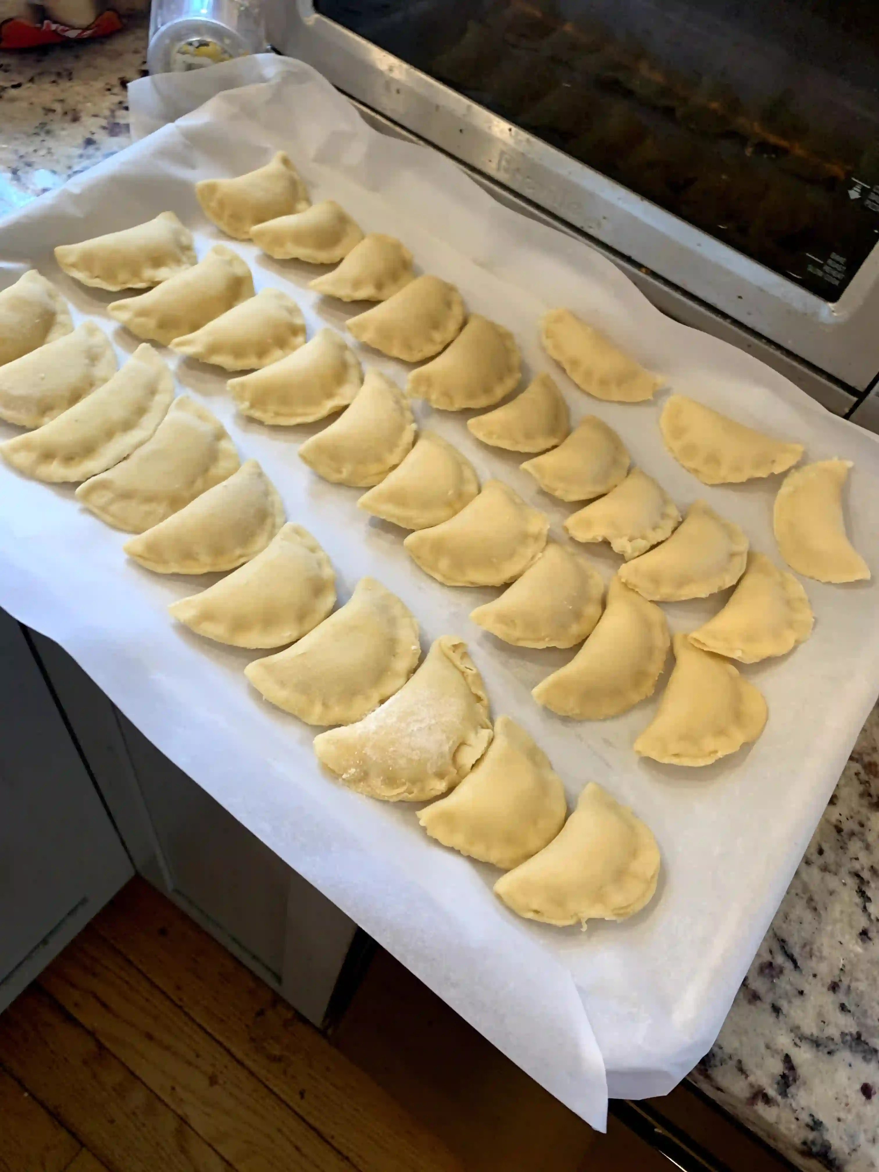 pierogies on a baking sheet